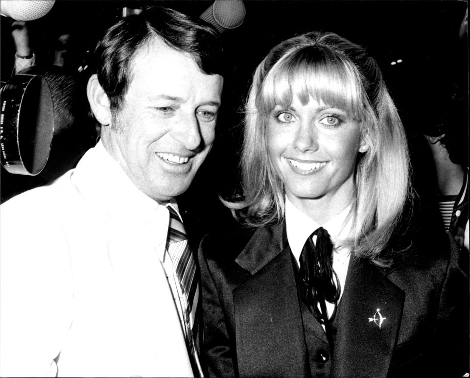 Olivia Newton-John arrives for the Premier of the Movie "Grease" at the Paramount Theatre.Man on Left Tom Goodley Sales supervisor MSS. August 03, 1978. (Photo by Julian Kevin Zakaras/Fairfax Media via Getty Images)