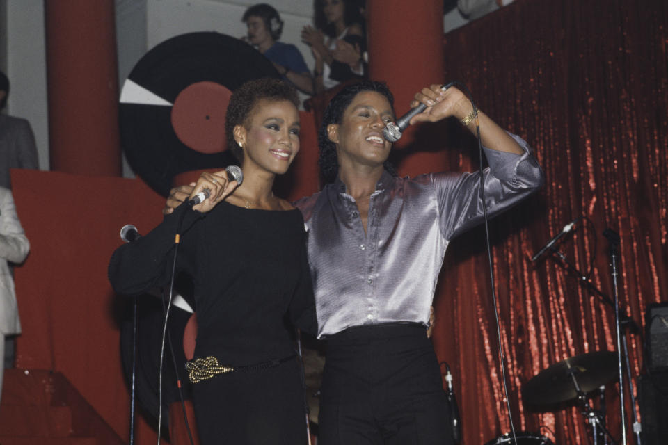 American singer Whitney Houston (1963-2012) performing with Jermaine Jackson at the Limelight in New York City, in July of 1984. (Photo: Dave Hogan/Getty Images)