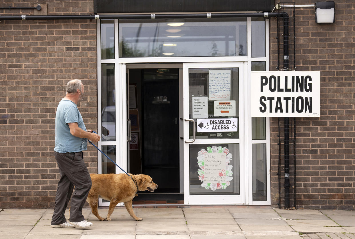 A man walks past a polling station sign outside Selby Community Centre in Selby North Yorkshire, during voting for the Selby and Ainsty by-election, called following the resignation of incumbent MP Nigel Adams. Picture date: Thursday July 20, 2023. (Photo by Danny Lawson/PA Images via Getty Images)