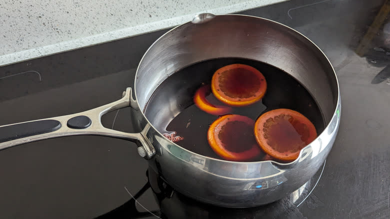 Mulled wine heating on stove