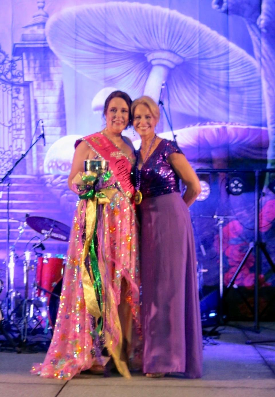 Krewe of Justinian XXX Captain Amy Gardner-Day with outgoing Captain XXIX Nancy Cooper at the krewe's coronation event on August 12, 2023.