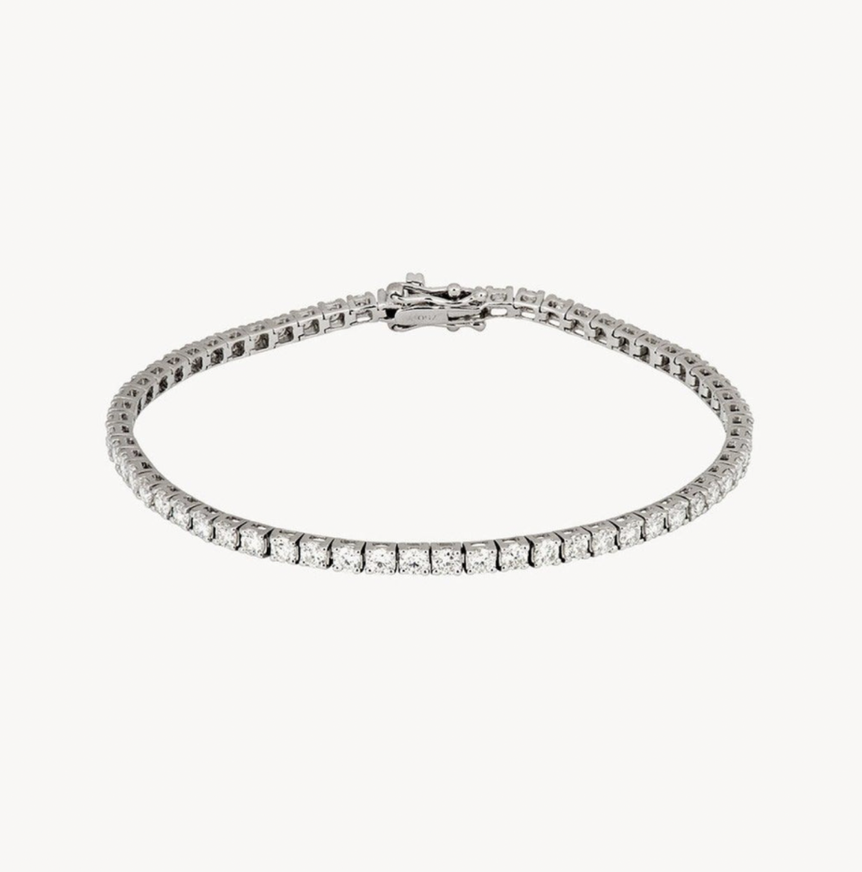 <p><a href="https://roxannefirst.com/en-us/collections/tennis-bracelets/products/white-diamond-tennis-bracelet" rel="nofollow noopener" target="_blank" data-ylk="slk:Shop Now;elm:context_link;itc:0;sec:content-canvas" class="link ">Shop Now</a></p><p>Tennis Bracelet</p><p>$5726.00</p><p>roxannefirst.com</p>