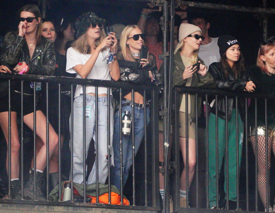 (centre left to right) Cara Delevingne, Mary Charteris and Anya Taylor-Joy watch Avril Lavigne performing on The Other Stage, at the Glastonbury Festival at Worthy Farm in Somerset. Picture date: Sunday June 30, 2024. (Photo by Ben Birchall/PA Images via Getty Images)