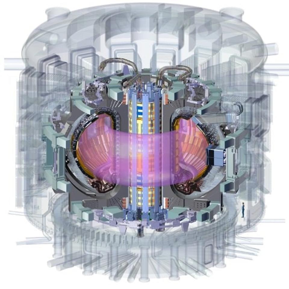 A rendering showing the complete ITER device, where a donut-shaped chamber will hold plasma that is superheated until nuclear fusion occurs between hydrogen ions. (ITER)