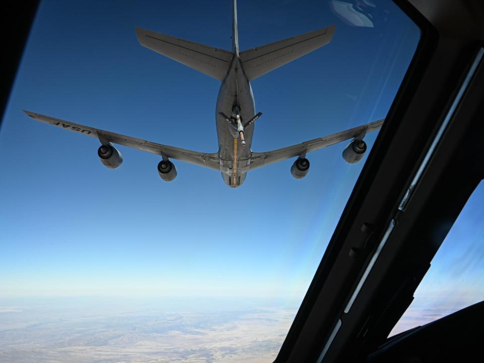 A KC-46 being refueled by a KC-135.