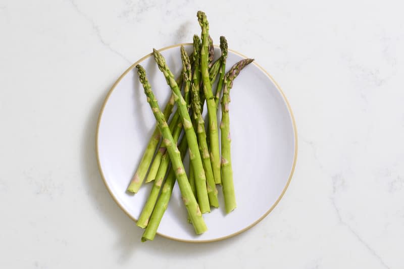 overhead shot of asparagus on a small plate