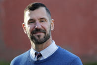 In this Monday, Oct. 28, 2019 photo, Seattle City Council candidate Egan Orion poses for a photo at his headquarters in Seattle. Seven of the nine Seattle City Council seats are up for grabs in next month's election, where retail giant Amazon has made unprecedented donations totaling $1.5 million to a political action committee that's supporting a slate of candidates perceived to be friendlier to business. Among the company's top targets is socialist council member Kshama Sawant, a fierce critic of Amazon, and Orion's opponent in the District 3 race. (AP Photo/Elaine Thompson)