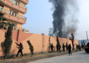 <p>Afghan security forces arrive at the site of a blast and gun fire in Jalalabad, Afghanistan, Jan. 24, 2018. (Photo: Parwiz/Reuters) </p>