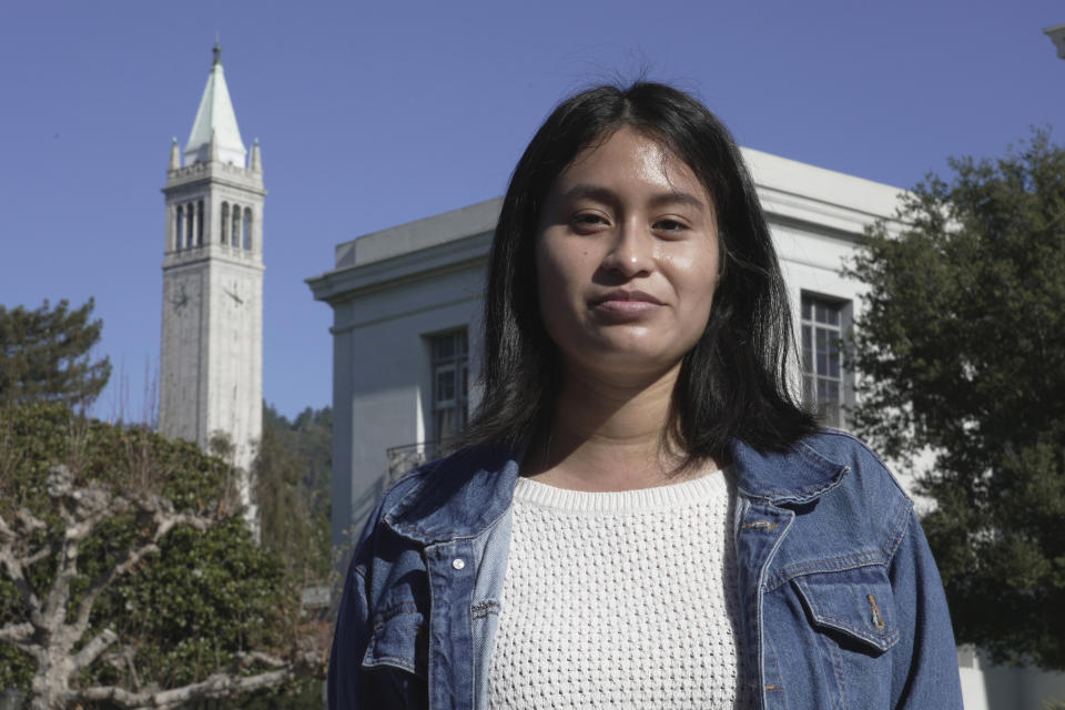 Susana Sotelo, a sophomore at the University of California, Berkeley, poses for a photo on campus in Berkeley, Calif., Wednesday, Dec. 7, 2022. A month into the nation's largest strike involving higher education, the work stoppage by University of California academic workers at is causing stress for many students who are facing canceled classes, and no one to answer their questions. Sotelo, 19, said she is not yet sure how she will be graded for her classes except for her psychology class, which will be considered successfully completed if she turns in her research project. (AP Photo/Terry Chea)