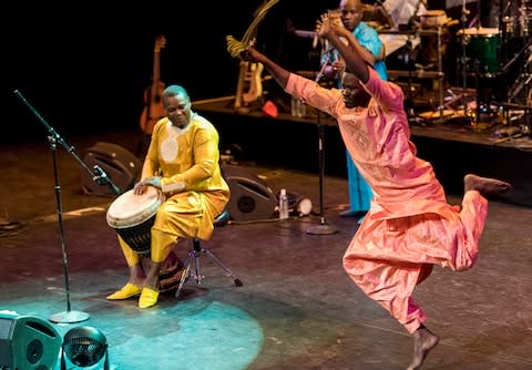 A Senegalese dancer performing with a Mbalax band - Credit: Getty