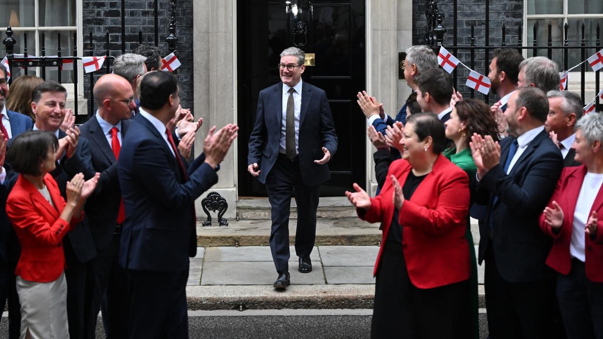  British Prime Minister Keir Starmer steps out of 10 Downing Street to greet Scottish MPs. 