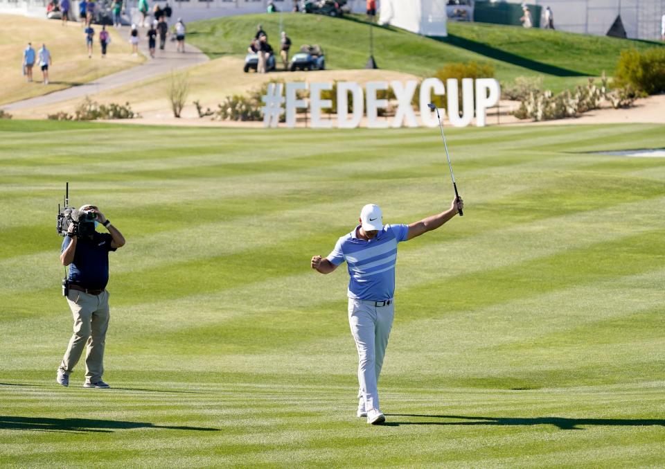 Feb 7, 2021; Scottsdale, Arizona, USA; Brooks Koepka reacts after making an eagle pitch on the par-4, 17th hole during the final round of the Waste Management Phoenix Open at TPC Scottsdale. Mandatory Credit: Rob Schumacher-Arizona Republic via USA TODAY Network