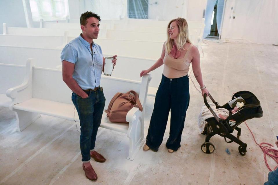 Johnny and Abby Youssef, with their daughter, Laney, examine the renovation of the the nave and sanctuary of the former Broadway Baptist Church. He is turning the church into a luxury wedding venue.