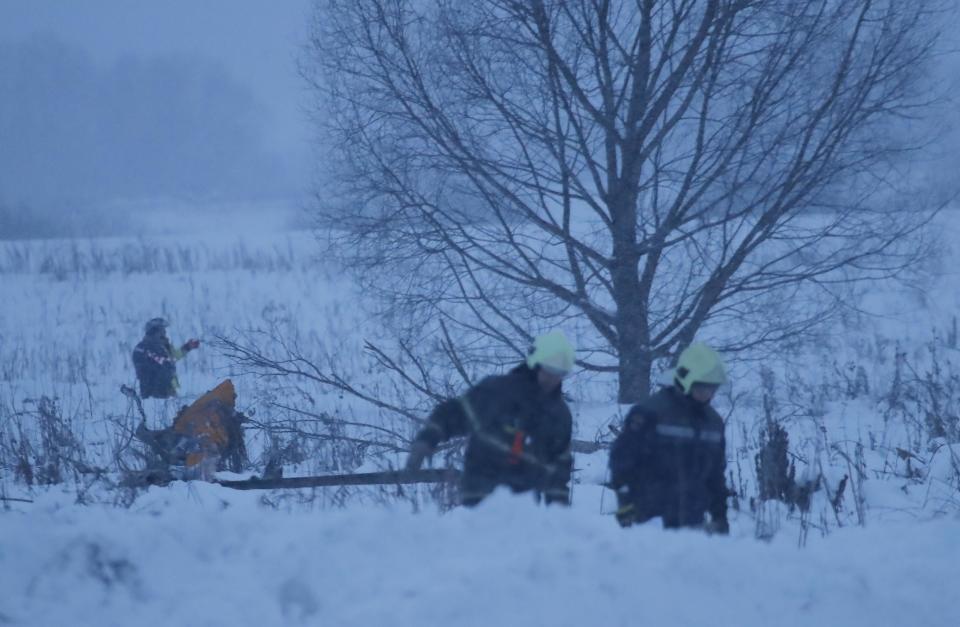 <p>Emergency services work at the scene where a short-haul regional Antonov AN-148 plane crashed after taking off from Moscow’s Domodedovo airport, outside Moscow, Russia on Feb. 11, 2018. (Photo: Maxim Shemetov/Reuters) </p>