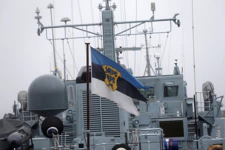 Estonian navy flag flutters on the mine hunting ship in the navy port in Tallinn, Estonia February 17, 2017. Picture taken February 17, 2017. REUTERS/Ints Kalnins