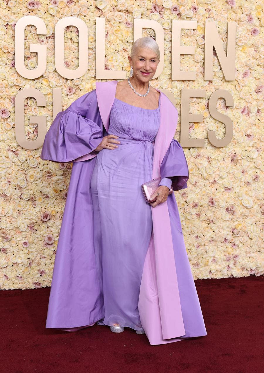 Helen Mirren in purple-pink pastels by Dolce & Gabbana continues her lifelong love of great fashion at the 81st annual Golden Globe Awards at The Beverly Hilton. (Amy Sussman/Getty Images)
