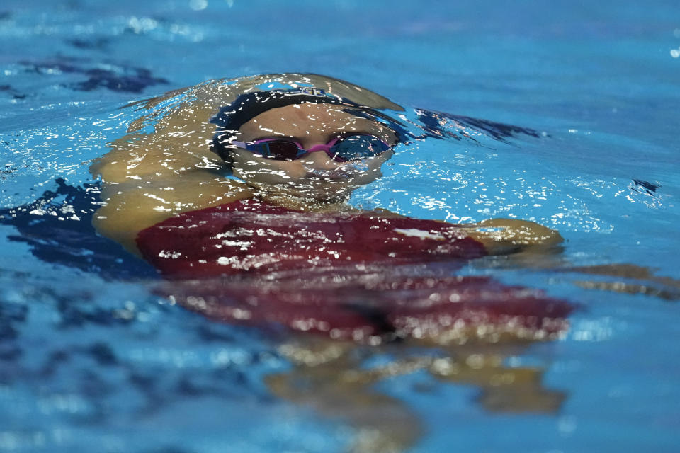 Kylie Masse of Canada competes in the women's 100 meter backstroke semi-final at the World Swimming Championships in Fukuoka, Japan, Monday, July 24, 2023. (AP Photo/Lee Jin-man)