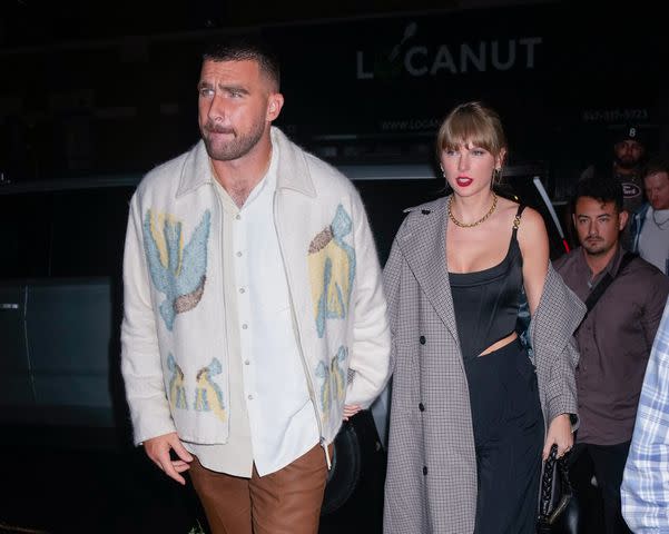 <p>Getty Images</p> Taylor Swift Travis Kelce Holding Hands Walking in New York City SNL Afterparty October 15, 2023