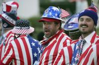 Fans in the gallery shout at players on the fifth hole during the third round of the Phoenix Open golf tournament Saturday, Feb. 10, 2024, in Scottsdale, Ariz. (AP Photo/Ross D. Franklin)