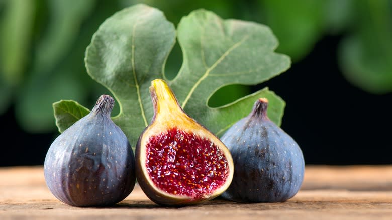 Fresh figs on wooden table