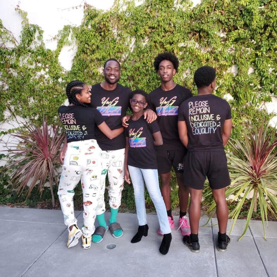 Gabrielle Union (L) and Dwyane Wade with his daughter Zaya, son Zaire and nephew Dahveon | Dwyane Wade/Instagram