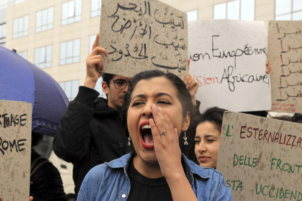 Activists demonstrate outside the delegation of the European Union to Tunisia against migrant deals with EU, in the capital Tunis, Thursday, May 9, 2024. Tensions in Tunisia are ratcheting up as authorities increasingly targeting migrants communities from the country's shoreline to its capital, where protestors staged a sit-in in front of European Union headquarters on Thursday. (AP Photo/Anis Mili)