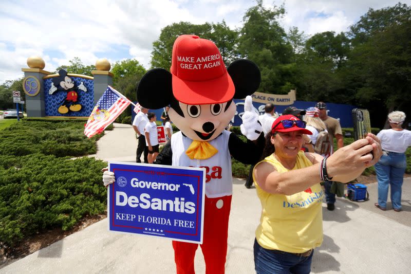 FILE PHOTO: Supporters of Florida's Republican-backed "Don't Say Gay" bill gather outside Walt Disney World