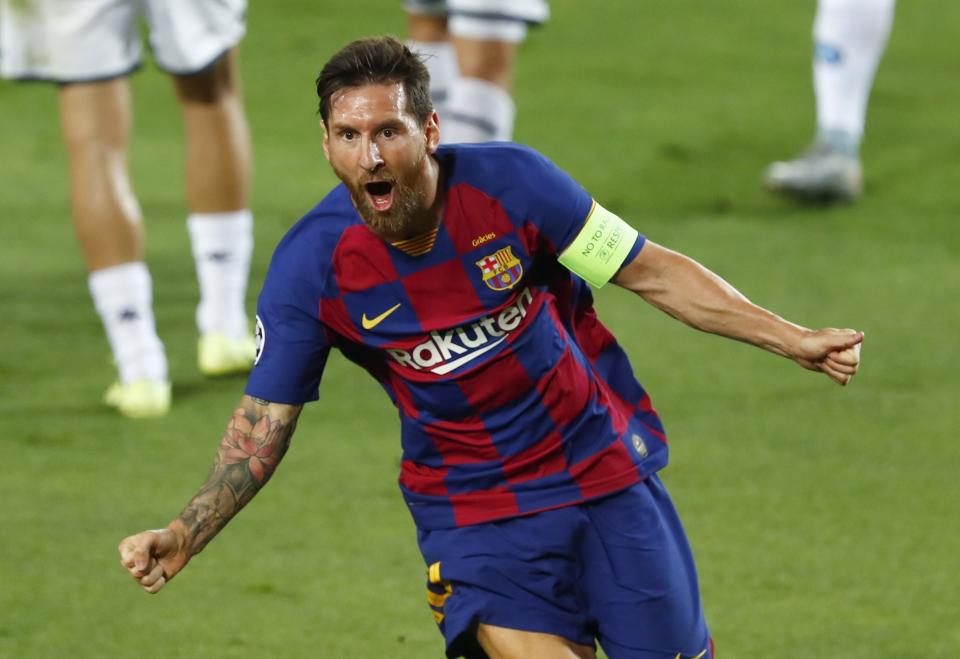 Barcelona's Lionel Messi celebrates after scoring his side's second goal during the Champions League round of 16, second leg soccer match between Barcelona and Napoli at the Camp Nou Stadium in Barcelona, Spain, Saturday, Aug. 8, 2020. (AP Photo/Joan Monfort)