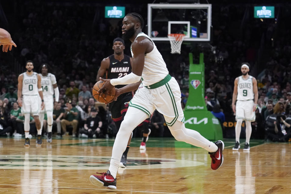 Boston Celtics guard Jaylen Brown (7) drives to the basket against the Miami Heat during the second half of Game 4 of the NBA basketball playoffs Eastern Conference finals, Monday, May 23, 2022, in Boston. (AP Photo/Charles Krupa)