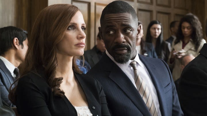 Jessica Chastain and Idris Elba as Molly and Charlie at court in Molly's Game