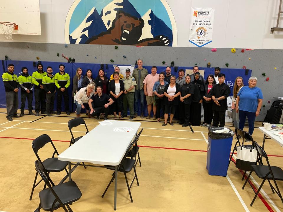 N.W.T. Premier R.J. Simpson, centre, visited Fort Good Hope and Norman Wells this week to meet with community members.