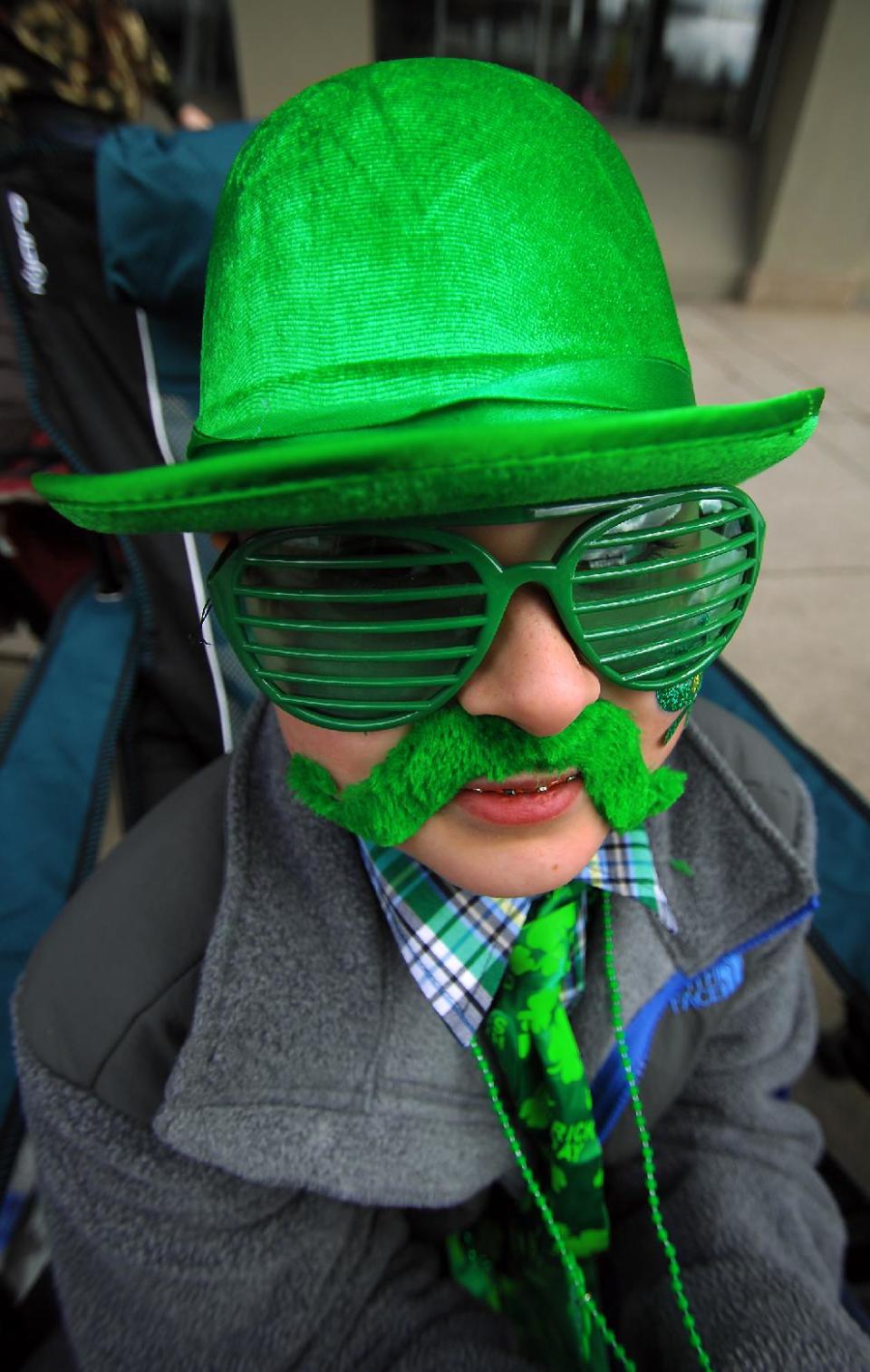 Zackary Richardson, 11, of Roaring Brook Township, Pa. wears a costume during the 53rd Scranton St. Patrick's Day Parade held in downtown Scranton, Pa. on Saturday, March 15, 2014. (AP Photo/The Scranton Times-Tribune, Butch Comegys)