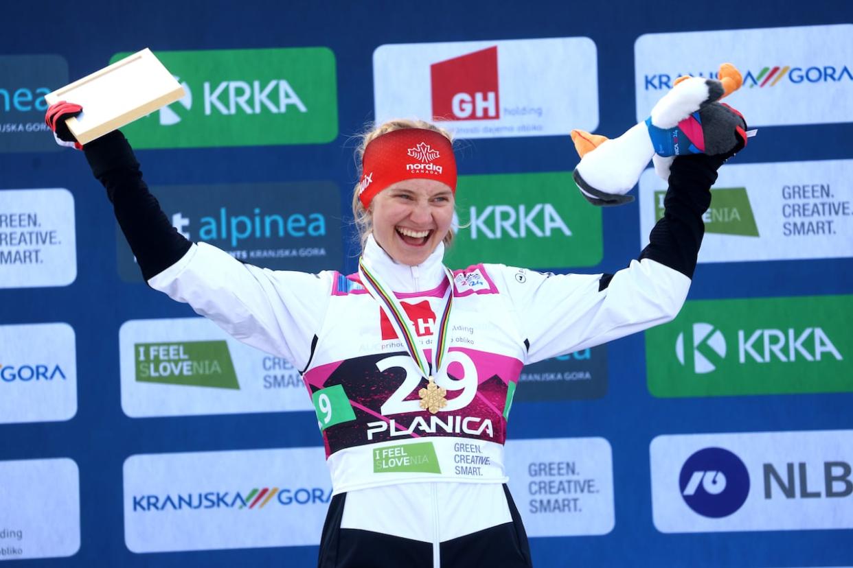 Sonjaa Schmidt of Whitehorse, after winning gold in the women's sprint event at the U23 Nordic World Ski Championships in Slovenia on Tuesday. Her win was considered the 'surprise of the meet so far,' said one commentator.   (Borut Živulović/BOBO/Graeme Williams - image credit)