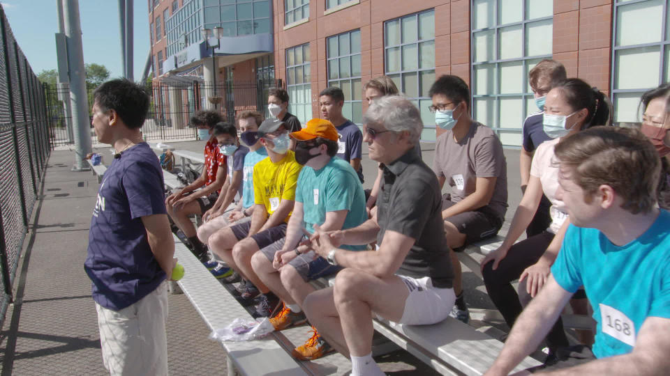 Mo Rocca and other aspiring ball persons get a demonstration of the ideal stance.  / Credit: CBS News