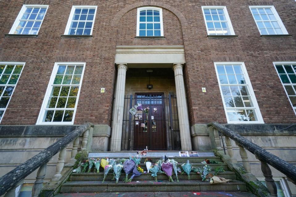 Tributes were left on the steps at Shrewsbury College for Jevon Hirst, Harvey Owen, Wilf Fitchett and Hugo Morris (PA)