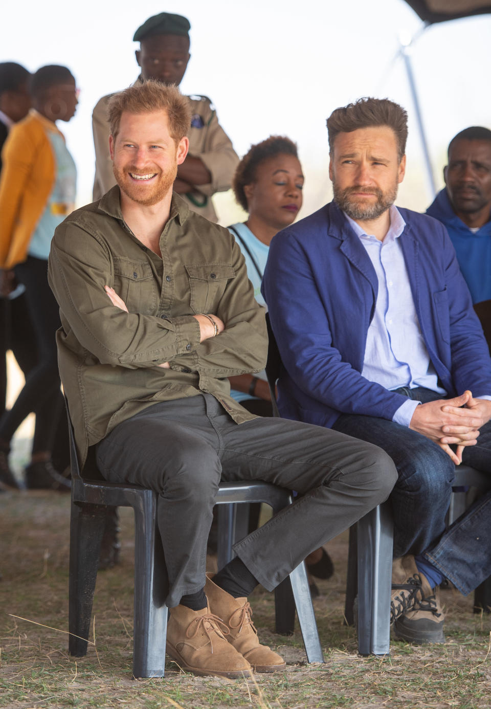 The Duke of Sussex (left) during a tree planting event with local school children, at the Chobe Tree Reserve, Botswana.