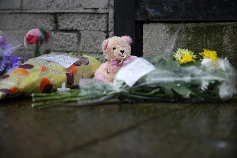 Flowers and tributes left outside one of the funeral branches (Getty Images)