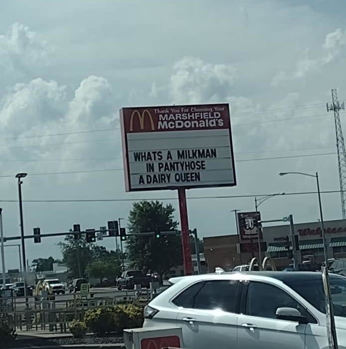 McDonald's sign says "What's a milkman in pantyhose? A dairy queen"