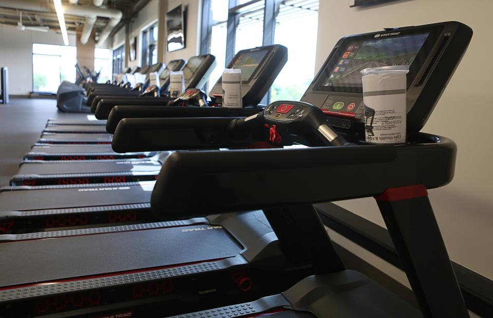 A series of treadmills line the wall at the new Middletown YMCA that opens on September 18, 2023.