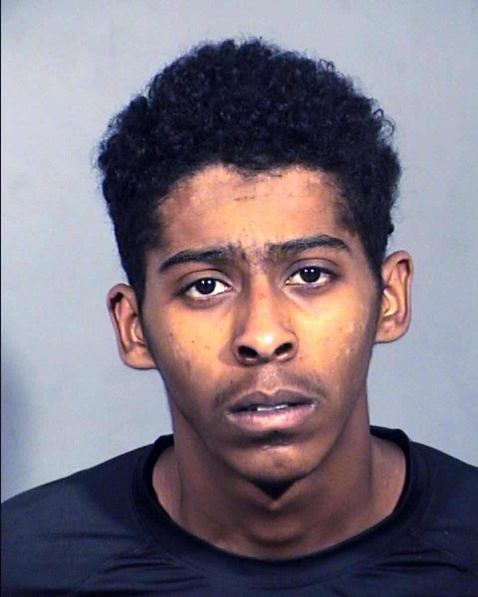 This undated booking photo provided by Las Vegas Metropolitan Police Department shows Richard Allen Newsome Jr., 17, of Las Vegas. He was charged as an adult Friday, Jan. 20, 2017, with murder in the Jan. 14, 2017, shooting death of Richard Nelson, 18, of Springfield, Mo. Nelson was a former star football player at Chaparral High School in Las Vegas, and was a freshman on the Missouri State University football team. (Las Vegas Metropolitan Police Department/Clark County Detention Center via AP)