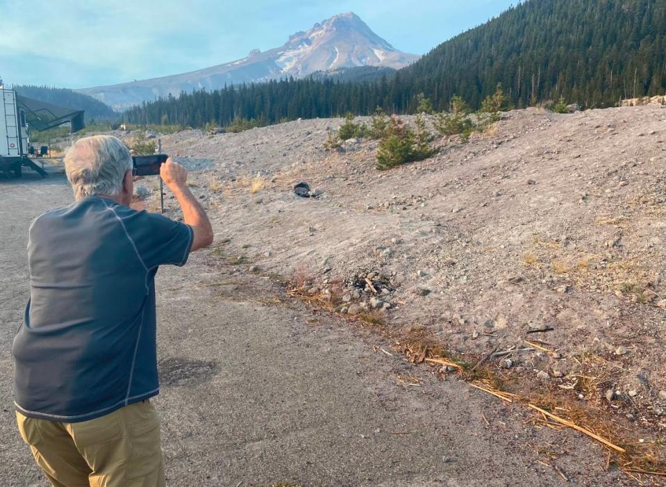 Janusz Warszawski, father of Fresno Bee columnist Marek Warszawski, lines up his iPhone for the perfect shot of Mount Hood during their September 2023 road trip to Oregon.