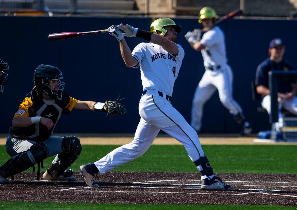 Notre Dame batter Danny Neri hits the ball against Valparaiso in a March baseball game.