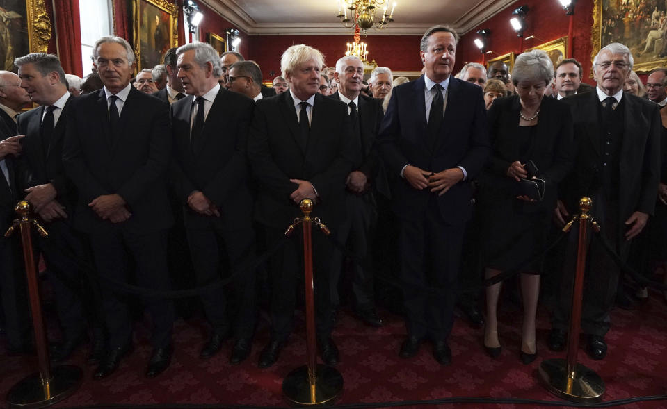 From left, Labour leader Sir Keir Starmer, former prime ministers Tony Blair, Gordon Brown, Boris Johnson, David Cameron, Theresa May and John Major ahead of the Accession Council ceremony at St James's Palace, London, London, Saturday, Sept. 10, 2022, where King Charles III is formally proclaimed monarch. (Kirsty O'Connor/Pool Photo via AP)