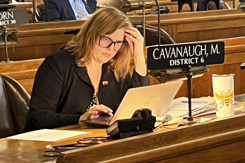 State Sen. Machaela Cavanaugh prepares to speak before the Nebraska Legislature Monday, March 13, 2023, at the Nebraska State Capital in Lincoln, Neb. Cavanaugh is in her third week of an effort to filibuster every bill that comes before the Legislature this session — even the ones she supports. The effort is a protest against conservatives' advancement of a bill that would outlaw gender-affirming therapies for those 18 and younger. Cavanaugh has declared she will "burn the session to the ground" in an effort to stymie the bill. (AP Photo/Margery Beck)