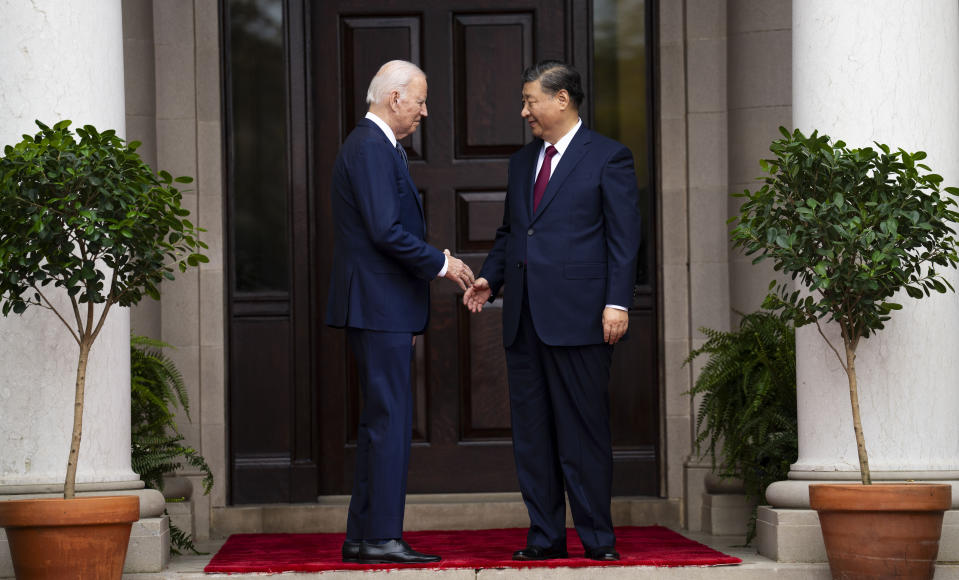 President Joe Biden greets China's President President Xi Jinping at the Filoli Estate in Woodside, Calif., Wednesday, Nov, 15, 2023, on the sidelines of the Asia-Pacific Economic Cooperative conference. (Doug Mills/The New York Times via AP, Pool)