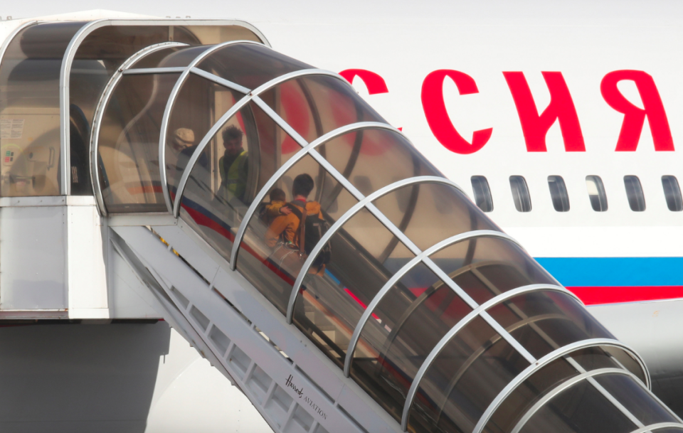 <em>Russian diplomats and their families board a plane after being expelled from the UK (Getty)</em>