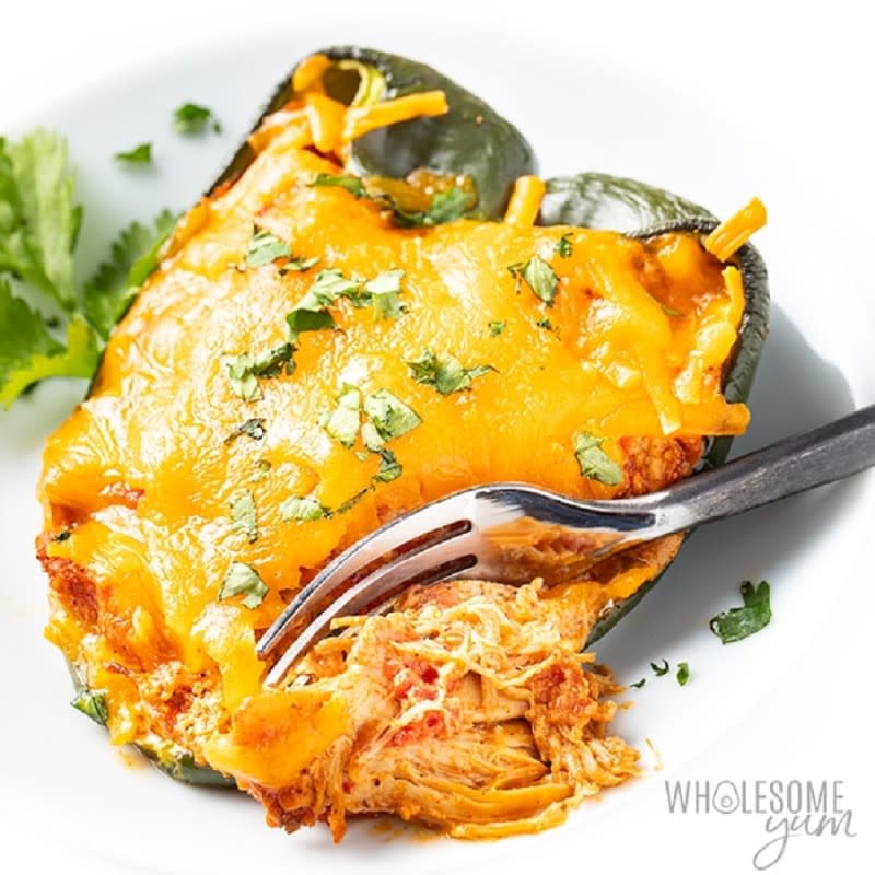 <p>Wholesome Yum</p><p>This cheesy chicken stuffed poblano peppers recipe is full of taco flavors.</p><p><strong>Get the recipe: </strong><a href="https://www.wholesomeyum.com/stuffed-poblano-peppers-recipe/" rel="nofollow noopener" target="_blank" data-ylk="slk:Mexican Keto Stuffed Poblano Peppers;elm:context_link;itc:0;sec:content-canvas" class="link rapid-noclick-resp"><strong>Mexican Keto Stuffed Poblano Peppers </strong></a></p>
