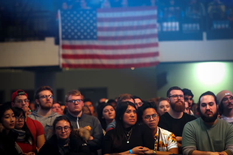 Supporters listen as Democratic U.S. presidential candidate Senator Bernie Sanders speaks at a campaign rally in Cedar Rapid