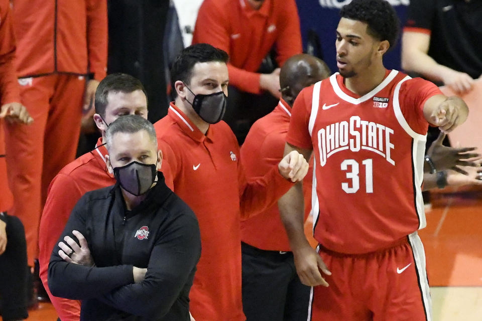 Ohio State Head Coach Chris Holtmann looks on from the sideline in the first half of an NCAA college basketball game against Illinois, Saturday, Jan. 16, 2021, in Champaign, Ill. (AP Photo/Holly Hart)