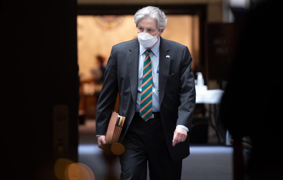 US Senator John Kennedy, Republican of Louisiana, wearing a mask to protect himself and others from COVID-19, known as coronavirus, leaves following the weekly Republican policy luncheon on Capitol Hill in Washington, DC, May 5, 2020. (Photo by SAUL LOEB / AFP) (Photo by SAUL LOEB/AFP via Getty Images)